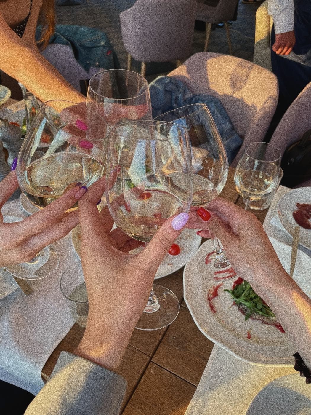Friends celebrating together on a group trip